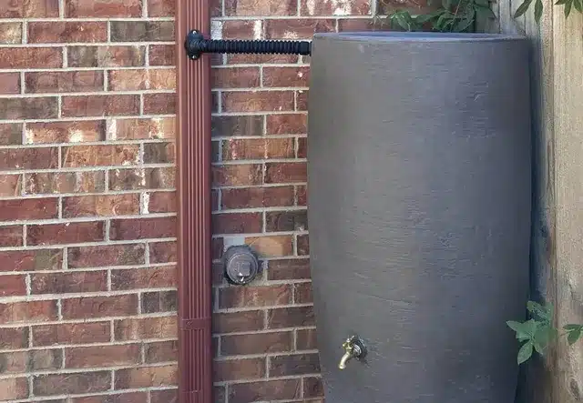 gray aesthetic rain water collection system in austin tx